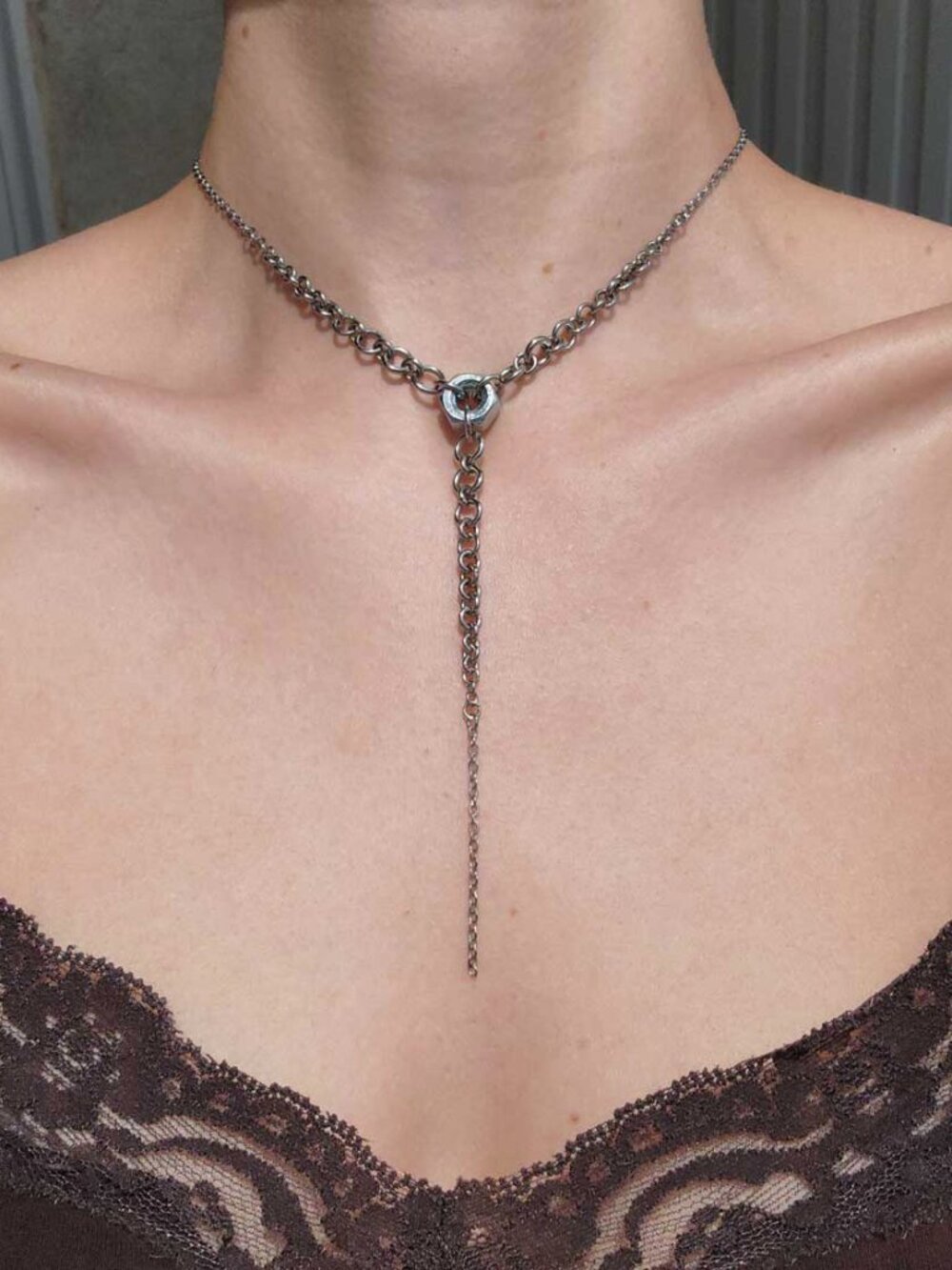 Gothic silver rosary necklace with a small silver chain
